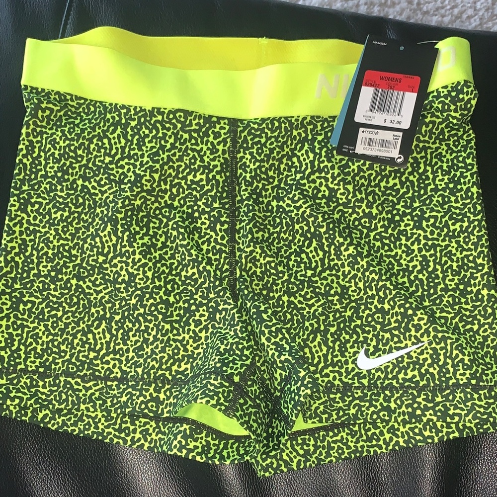 NWT. Nike Women's Bright Green Patterned Spandex Shorts